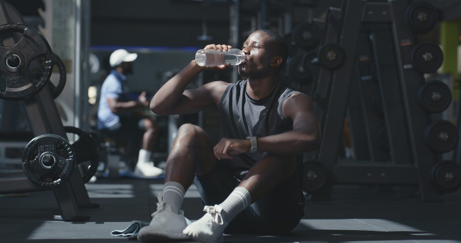 Man recovering at the gym after a workout